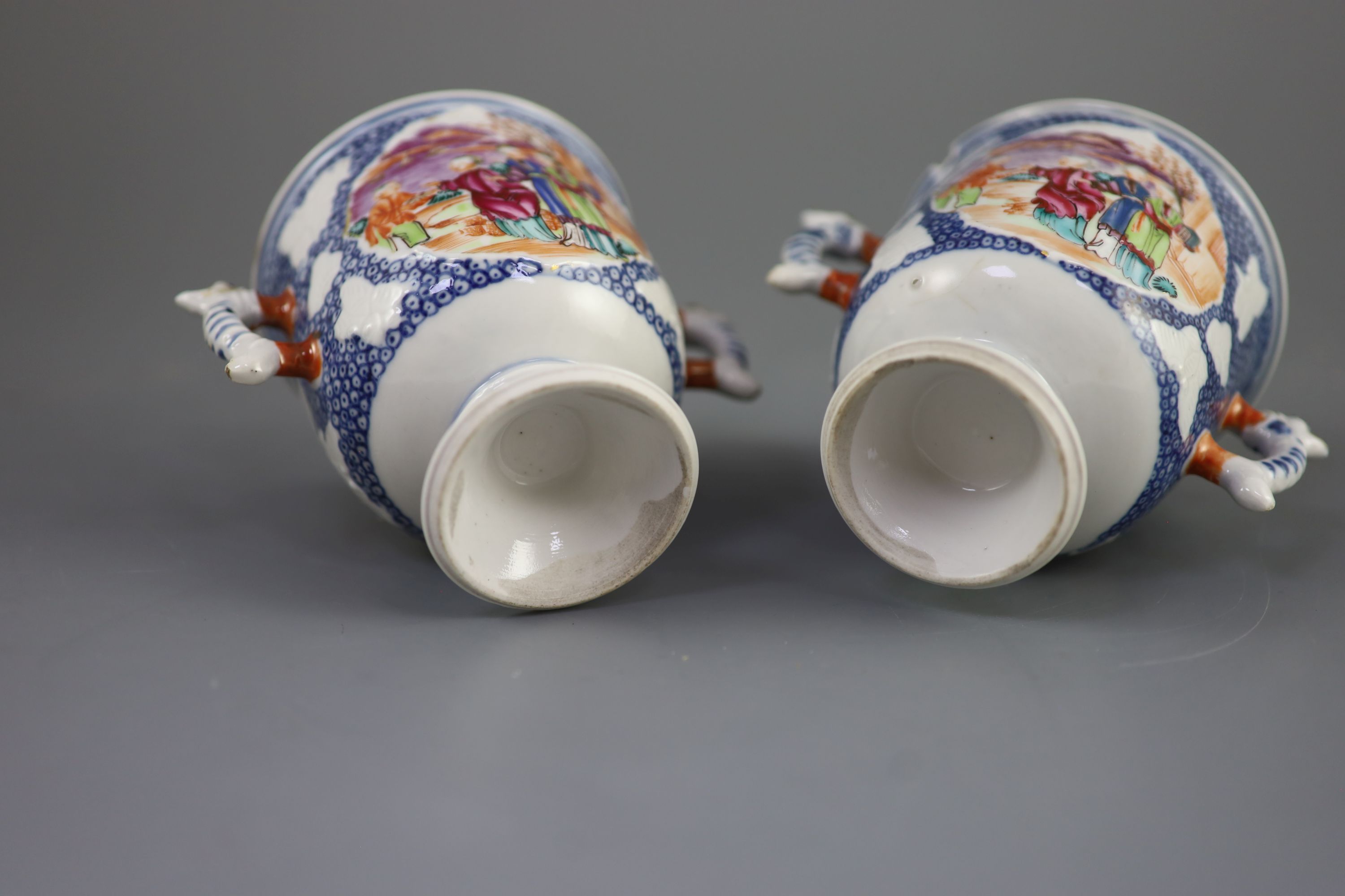 A pair of Chinese famille rose two handled cups, Qianlong period, 9.5cm high, slight faults